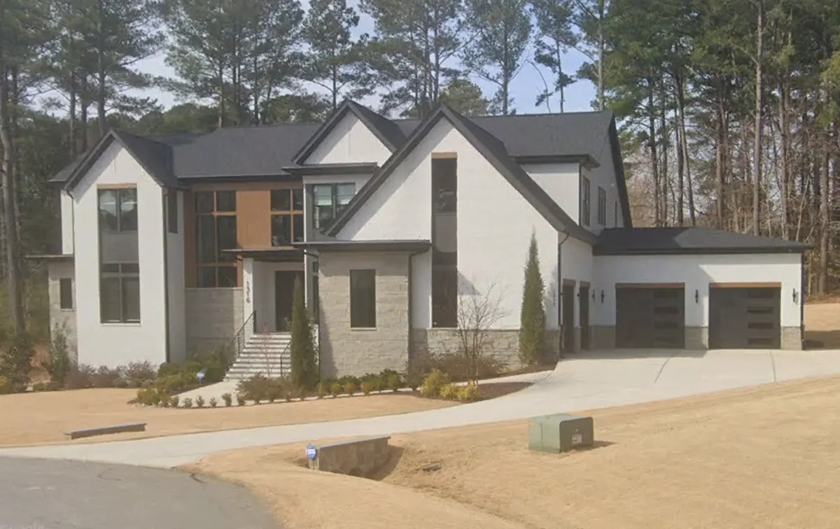 Actual Photos of House 6 – 2-Story House Plan 6261 ft²: 4 Beds, Home Office, 5.5 Baths, Open Floor Plan, 4-Car Garage — 93555R