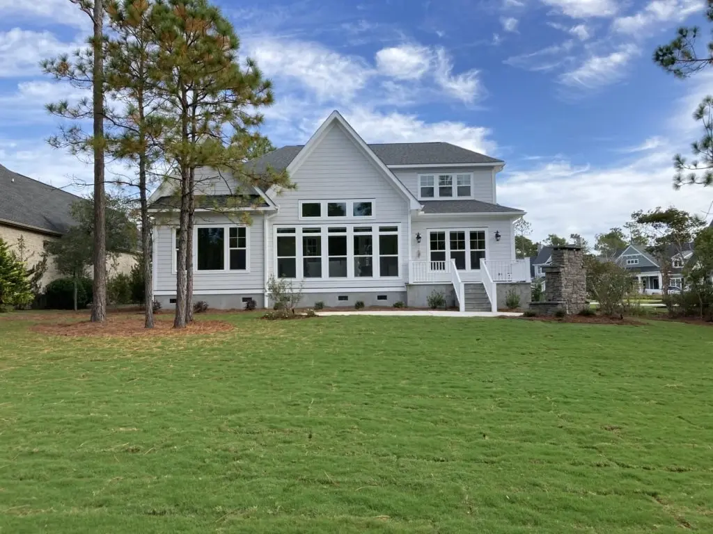 Actual Photos of House 6 – 1.5-Story House Plan 3371 ft²: 3 Beds, Home Office, 3.5 Baths, Open Floor Plan, 2-Car Garage — 90504R