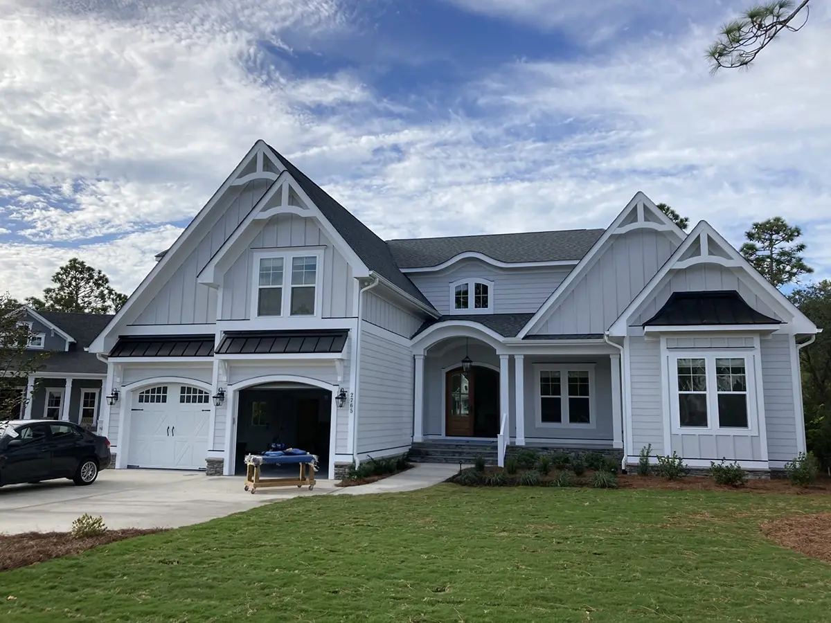 Actual Photos of House 5 – 1.5-Story House Plan 3371 ft²: 3 Beds, Home Office, 3.5 Baths, Open Floor Plan, 2-Car Garage — 90504R