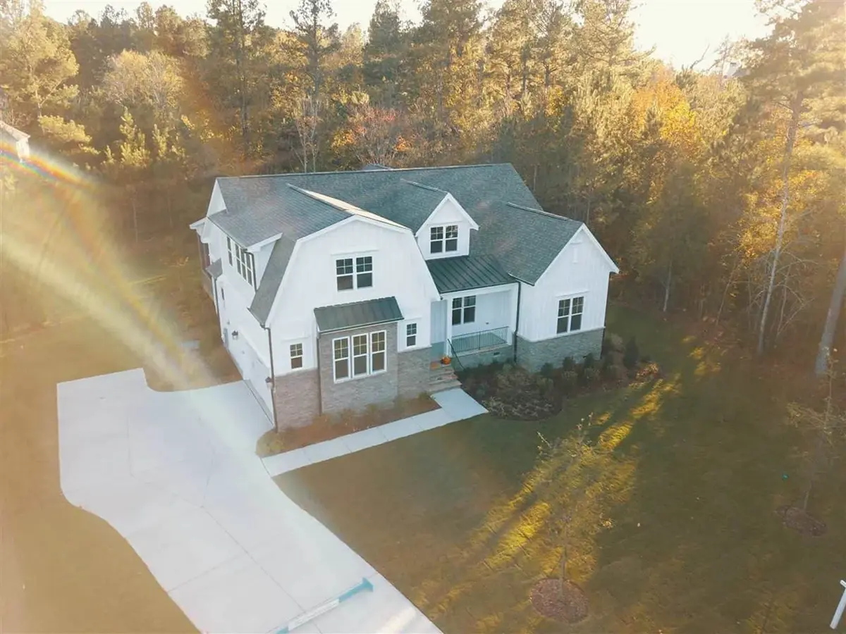 Actual Photos of House 15 – 1.5-Story House Plan 3062 ft²: 4 Beds, 3.5 Baths, Open Floor Plan, 2-Car Garage — 97890R