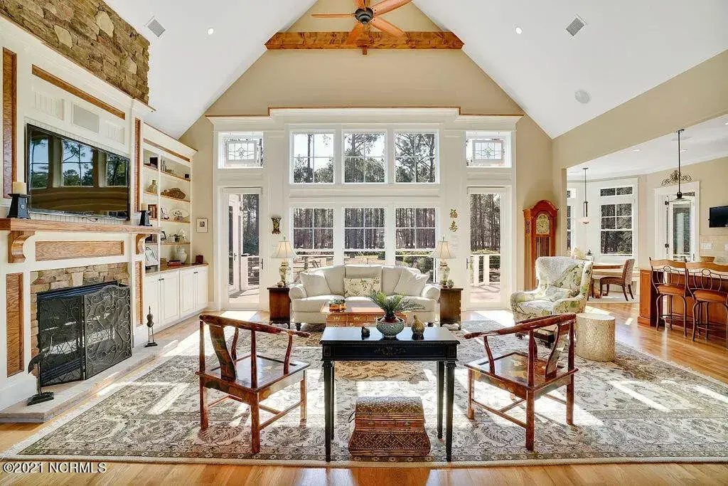 1.5-Story House Plan 3657 ft²: 3 Beds, Home Office, 3.5 Baths, Open Floor Plan, 2-Car Garage