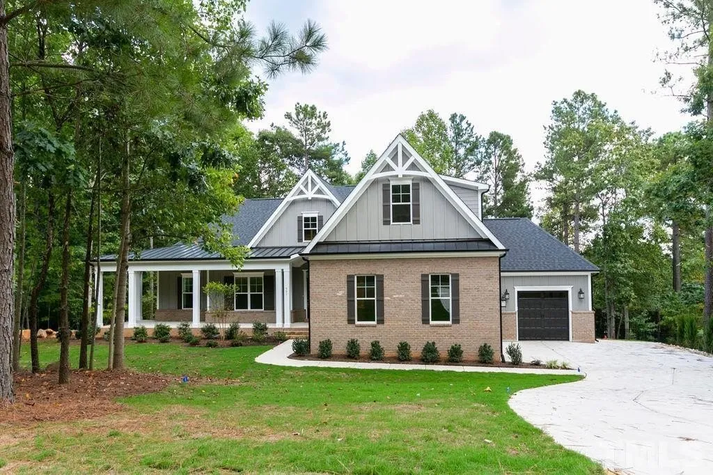 1.5-Story House Plan 3198 ft²: 4 Beds, Home Office, 3.5 Baths, Open Floor Plan, 3-Car Garage