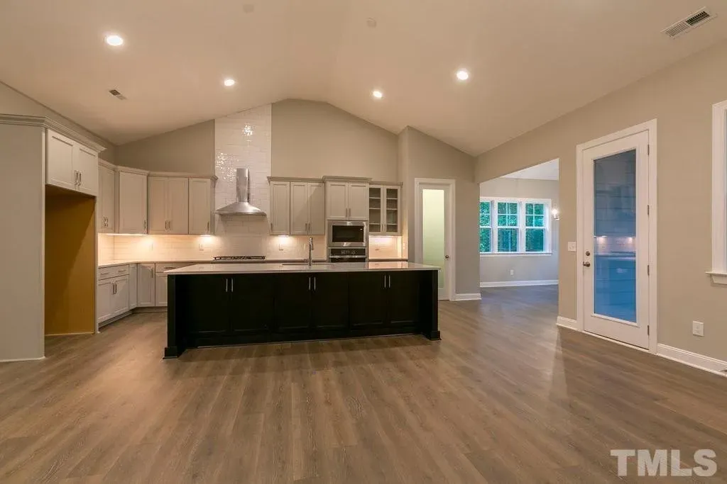 1.5-Story House Plan 3198 ft²: 4 Beds, Home Office, 3.5 Baths, Open Floor Plan, 3-Car Garage