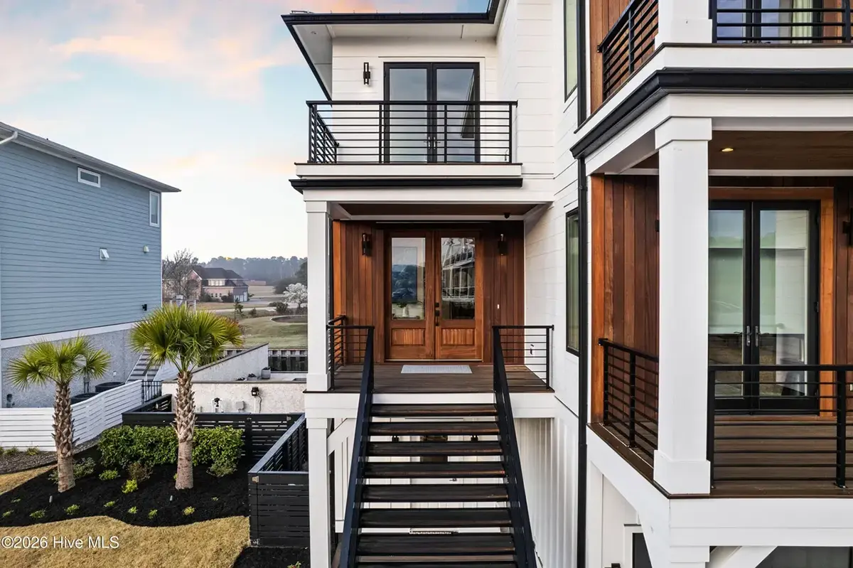 3-Story House Plan 4803 ft²: 5 Beds, Home Office, 5.5 Baths, Open Floor Plan, 4-Car Garage