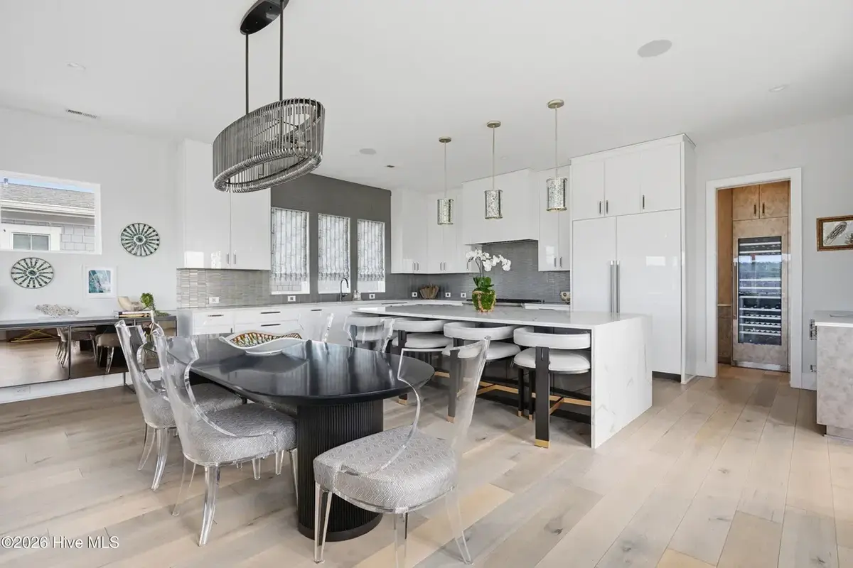 3-Story House Plan 4803 ft²: 5 Beds, Home Office, 5.5 Baths, Open Floor Plan, 4-Car Garage