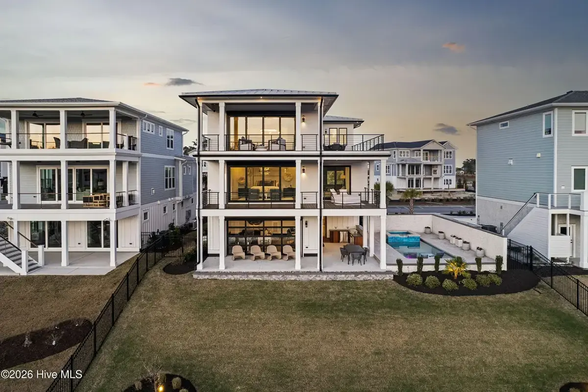 3-Story House Plan 4803 ft²: 5 Beds, Home Office, 5.5 Baths, Open Floor Plan, 4-Car Garage