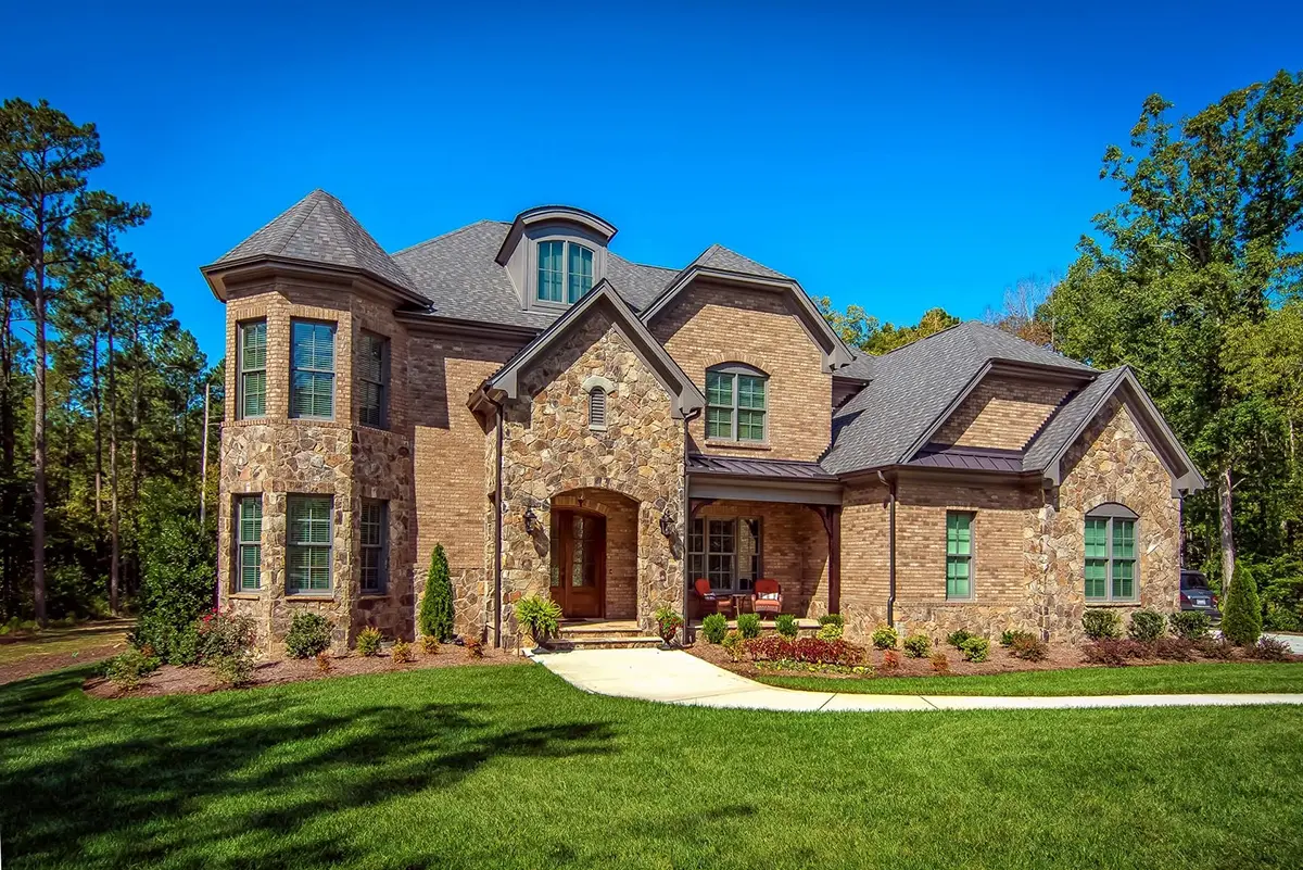 Main Images 5 – 3-Story House Plan 5355 ft²: 5 Beds, Home Office, 5.5 Baths, 3-Car Garage — 85576R