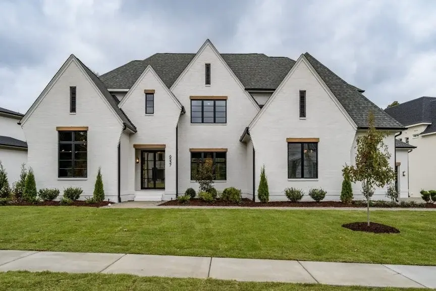 Actual Photos of House 15 – 2-Story House Plan with Basement 6450 ft²: 6 Beds, Home Office, 6.5 Baths, Open Floor Plan, 3-Car Garage — 36963R
