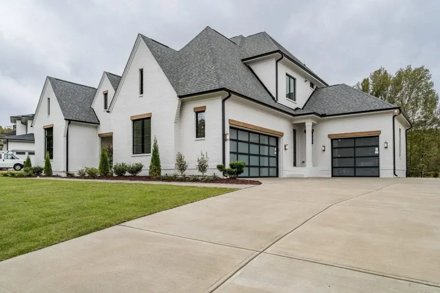Actual Photos of House 17 – 2-Story House Plan with Basement 6450 ft²: 6 Beds, Home Office, 6.5 Baths, Open Floor Plan, 3-Car Garage — 36963R