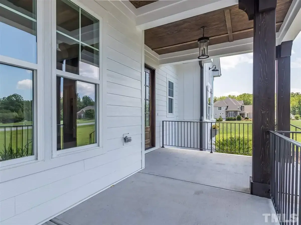 Actual Photos of House 7 – 1.5-Story House Plan 3912 ft²: 5 Beds, 4.5 Baths, Open Floor Plan, 3-Car Garage — 64220R
