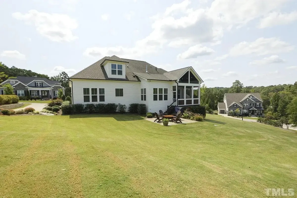 Actual Photos of House 15 – 1.5-Story House Plan 3030 ft²: 4 Beds, 3.5 Baths, Open Floor Plan, 3-Car Garage — 59002R